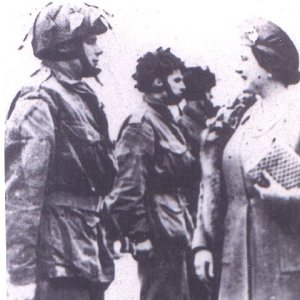 G. Escaravage (talking to the Queen)