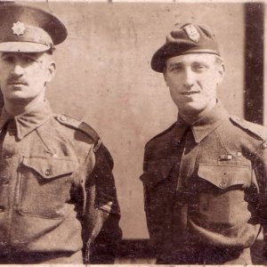 J. Alcock (right)