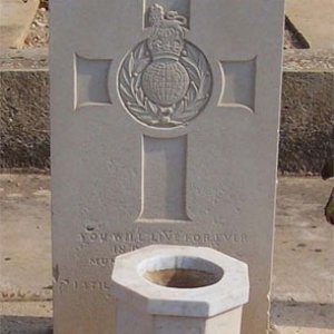 C. White (grave)