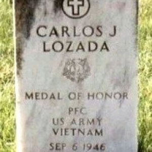 C. Lozada (grave)