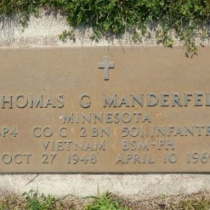 T. Manderfeld