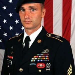 D. Whitcher