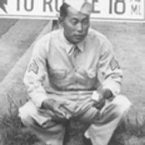 E. Mitsukado