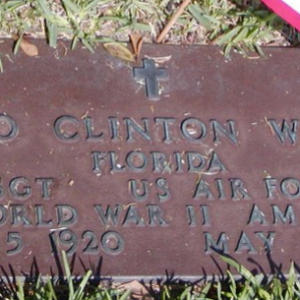 C. White (grave)