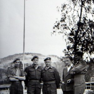 A. Mann (centre)