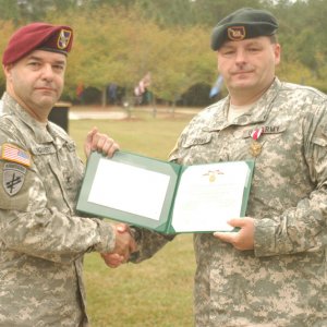 T. Strong (right)
