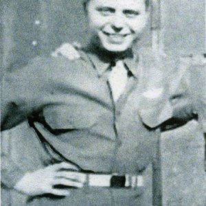 E. Kussman