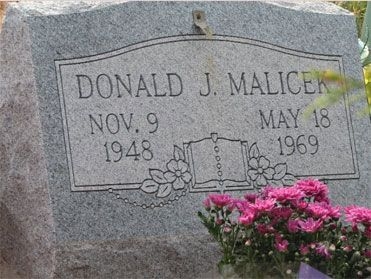 D. Malicek (grave)
