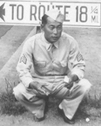 E. Mitsukado